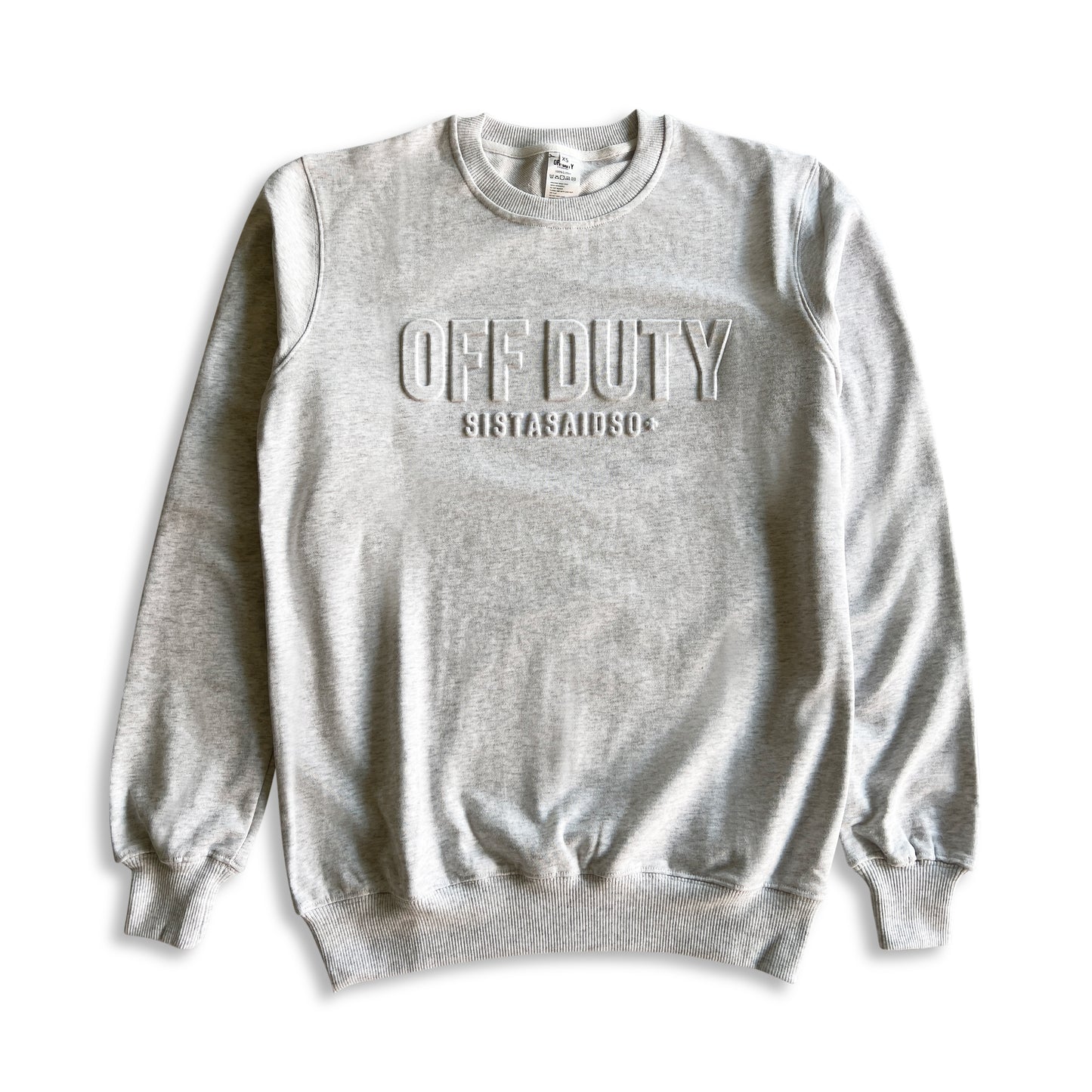 Flat Lay OFF DUTY™️ Unisex Cloud nurse women's Sweater and nurse accessory from Sistasaidso