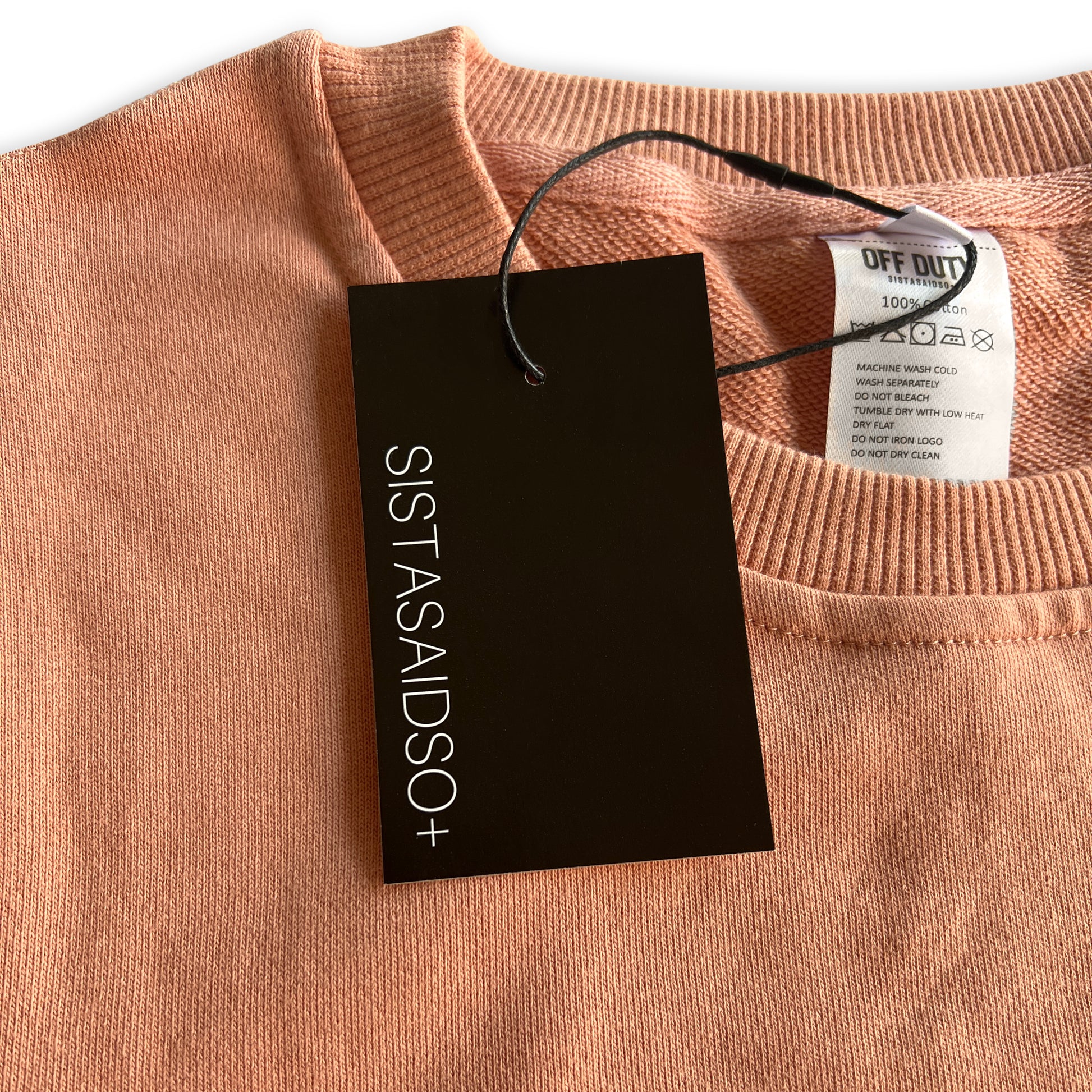 OFF DUTY™️ Unisex Peach nurse women's Sweater and nurse accessory from Sistasaidso close up